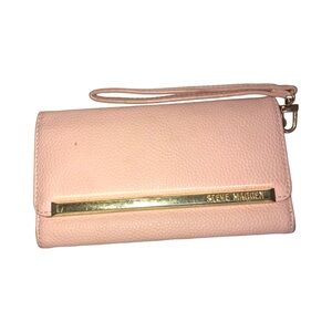 Steve Madden Pink Wristlet Clutch it has a tiny spot